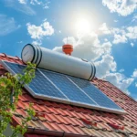 A-solar-water-heater-in-the-style-with-credit-on-the-roof-of-a-house